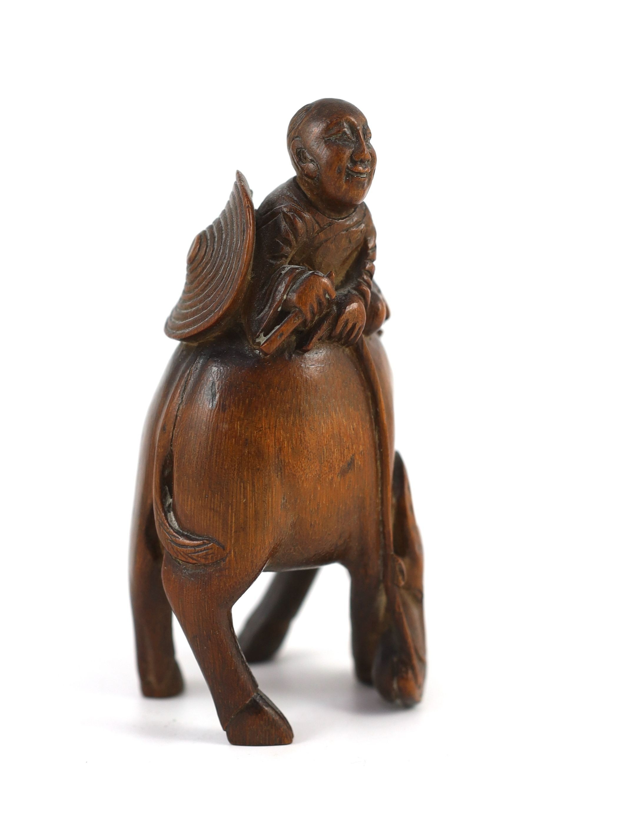 A Chinese bamboo group of boy riding a buffalo, 18th/19th century, 12.5 cm high